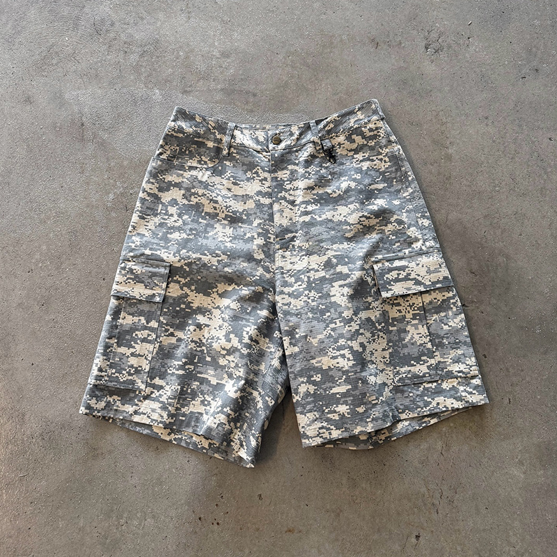 This clothing manufacturer tailors camo shorts for brands' needs.camo shorts